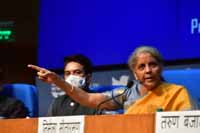 Union Minister for Finance and Corporate Affairs, Nirmala Sitharaman addressing a Post Budget 2021 Press Conference, in New Delhi, India on 1st February 2021. The Minister of State for Finance and Corporate Affairs, Shri Anurag Singh Thakur in the picture Union Minister for Finance and Corporate Affairs, Nirmala Sitharaman addressing a Post Budget 2021 Press Conference, in New Delhi, India on 1st February 2021. The Minister of State for Finance and Corporate Affairs, Shri Anurag Singh Thakur in the picture